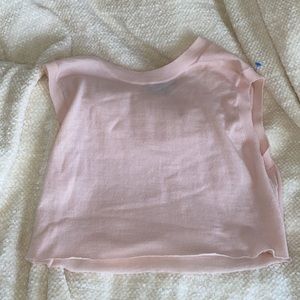 Pink sweater vest (cropped)